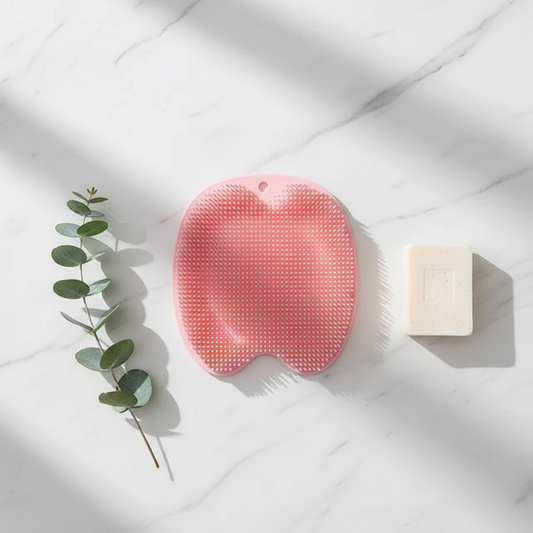 Silicone Multiuse Scrubber – white marble flat lay with soap and eucalyptus